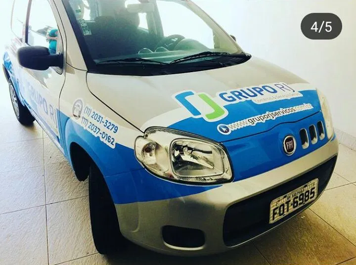 Envelopamento Uno Passeio Adesivo Parcial Frotas Hatch Sedan Azul Veículos Carros Empresas Adesivação