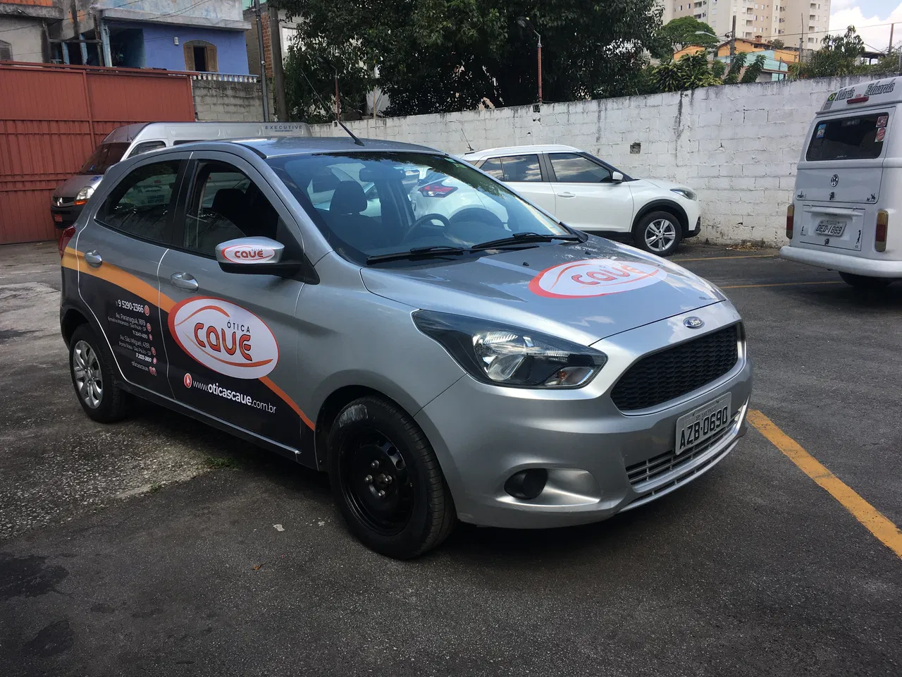 Envelopamento Adesivo Frotas Carros Ford Ka Utilitários Ótica Parcial Passeio Hatch Sedan Preto Laranja